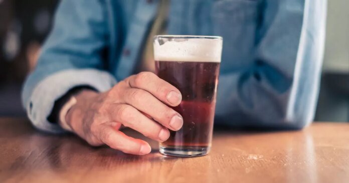 0_older-man-holding-glass-for-beer